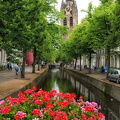 View down the Oude Delft and the Oude Kerk clock tower